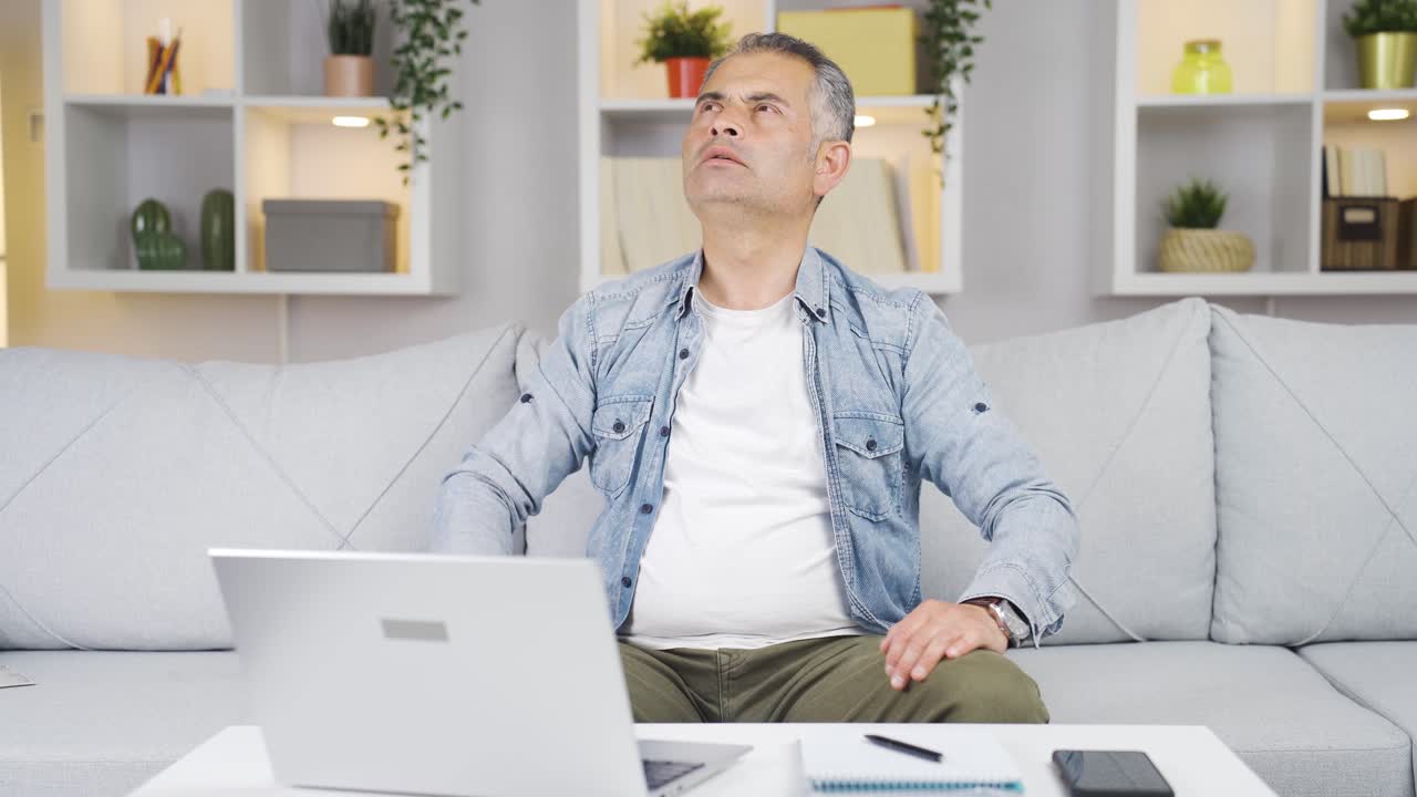 Confused man thinks and can't figure it out.