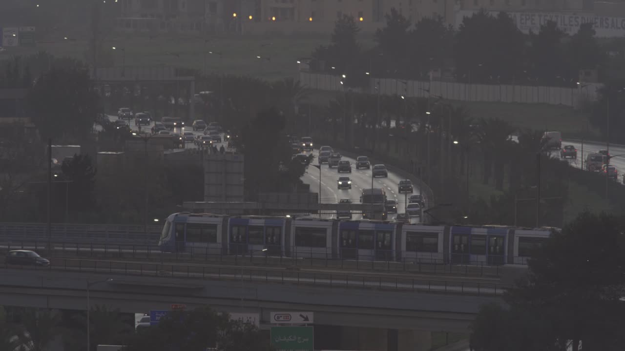 Traffic on a distant highway at Sunrise