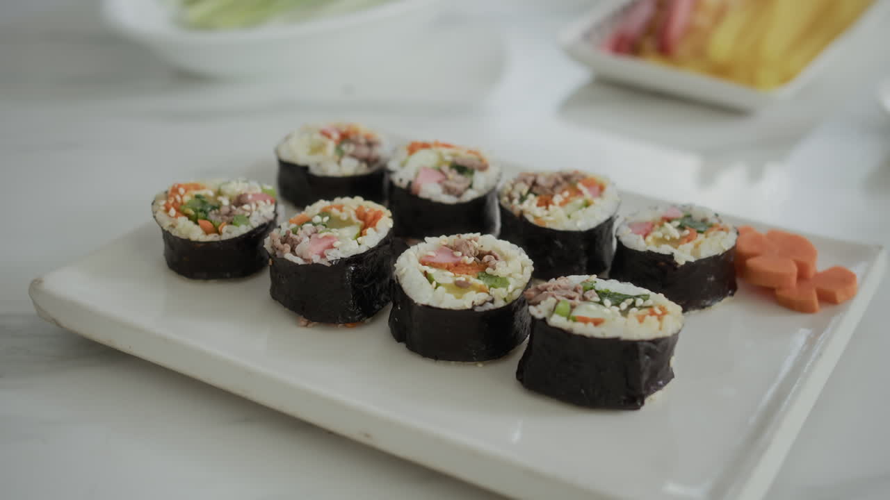 Homemade Kimbap on Plate at Kitchen Table