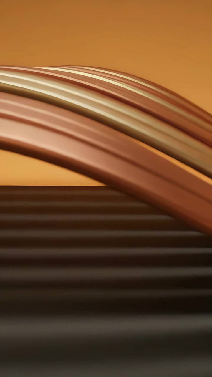 Vertical video: Animation starting metallic ribbons curving over ribbed base in ochre set, shining
