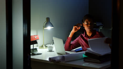 stressed female executive sitting at desk 4k