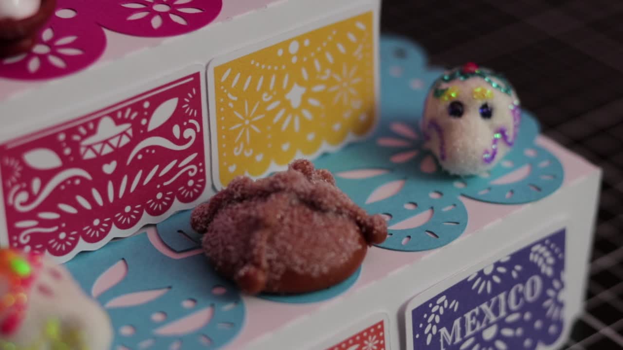 Dia de Muertos Ofrenda with Pan de Muerto and Calaveras