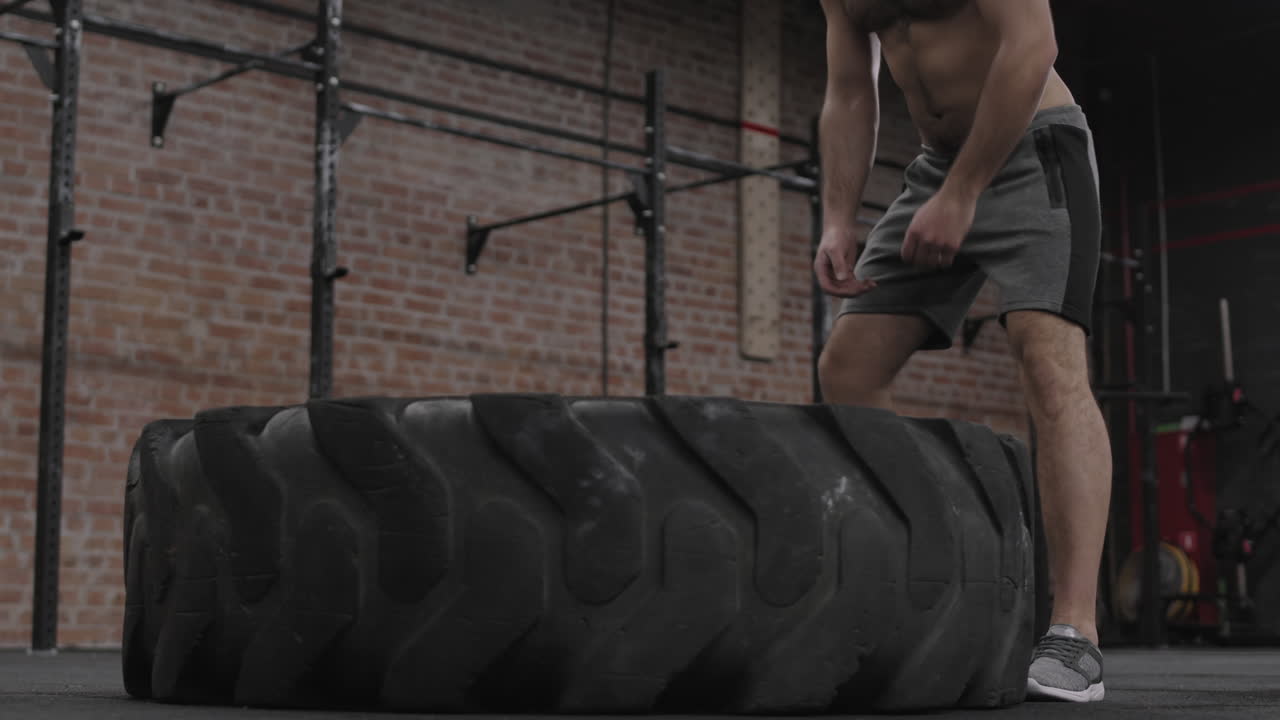 Young Sportsman Flipping Huge Tire