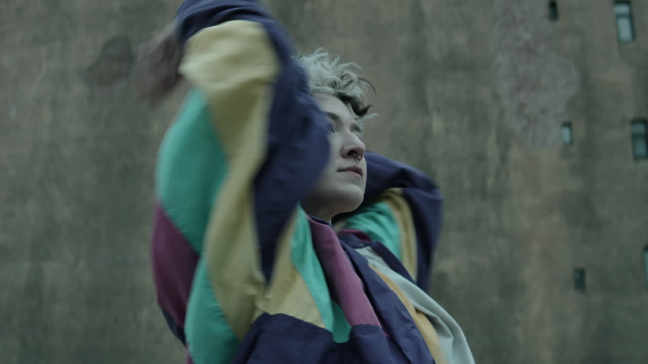 Girl in Vintage Jacket Dancing Vogue Outdoors