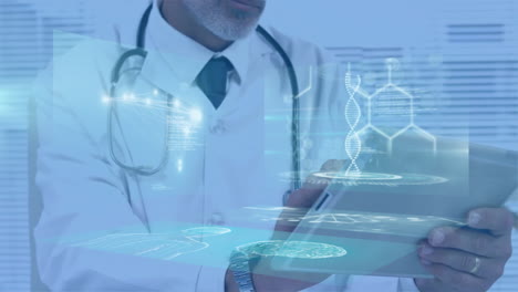 using tablet with dna animation, doctor reviewing medical data in office