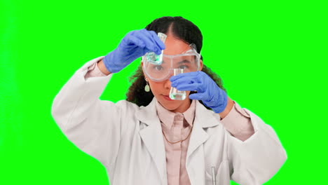 Science,-goggles-and-a-woman-mixing-on-a-green