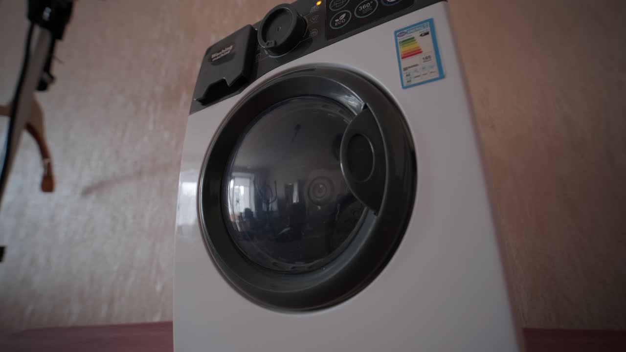 Miniature Toy Washing Machine Operating and Spinning