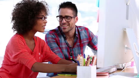 Attractive-designers-working-together-on-a-computer