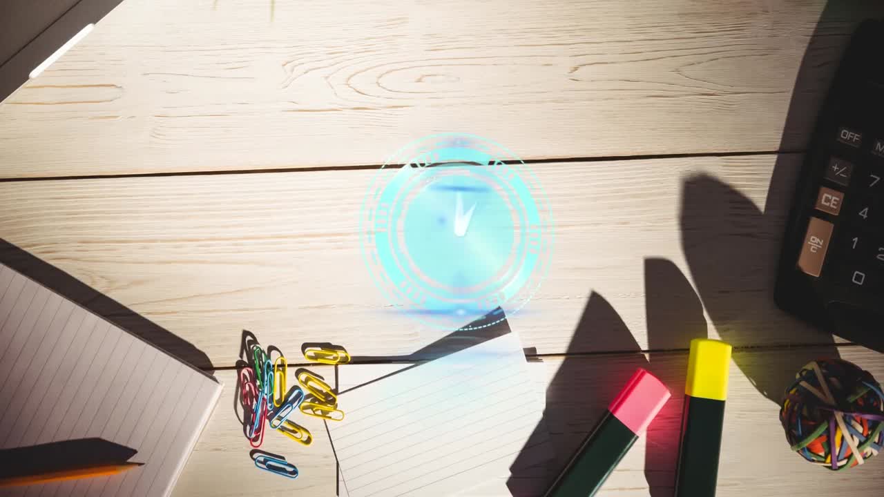 책상 위의 노트북 위의 시계의 애니메이션