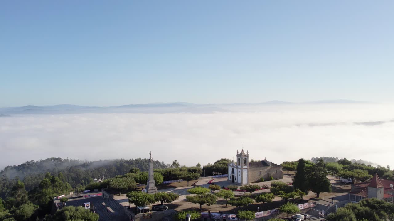 Fog blankets the Monte Franqueira sanctuary in Barcelos, surrounded by lush greenery