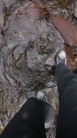 hiking through a stream