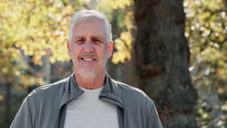 portrait of a smiling older man outdoors