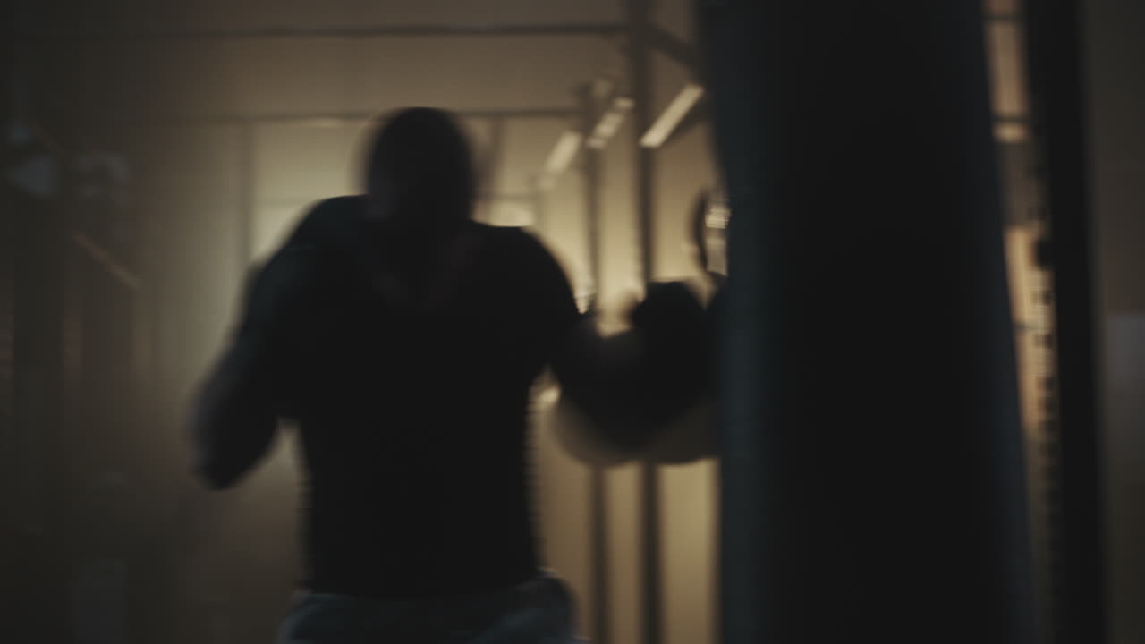Man Boxing in Gym