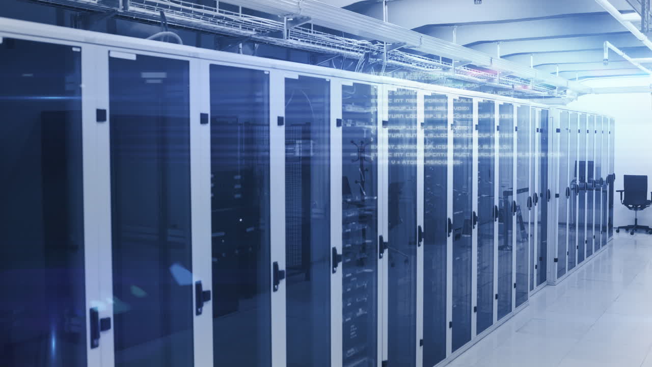 Computer servers in a server room with glowing lights