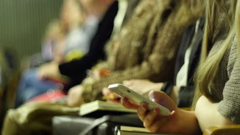 girl with long hair using mobile phone