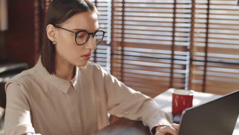 Young-Businesswoman-Working-on-Laptop