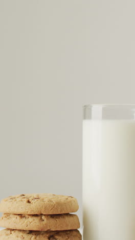 video of biscuits with chocolate and milk on white background