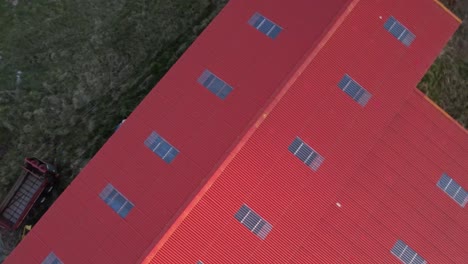 countryside aerial footage with green fields and cottages