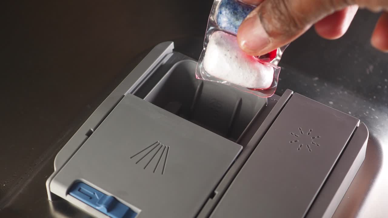 Loading a dishwasher with a detergent pod