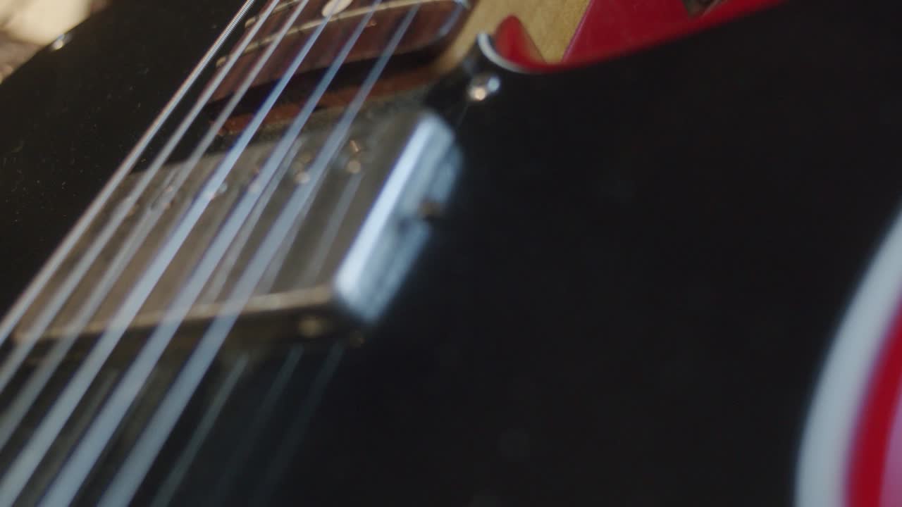 Red fender stratocaster with strings