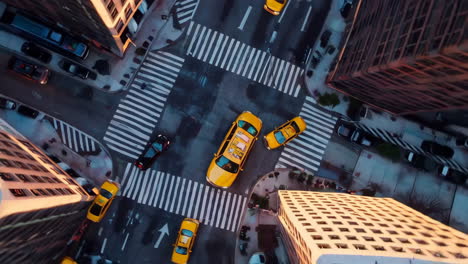 aerial view of yellow taxis at a busy city intersection