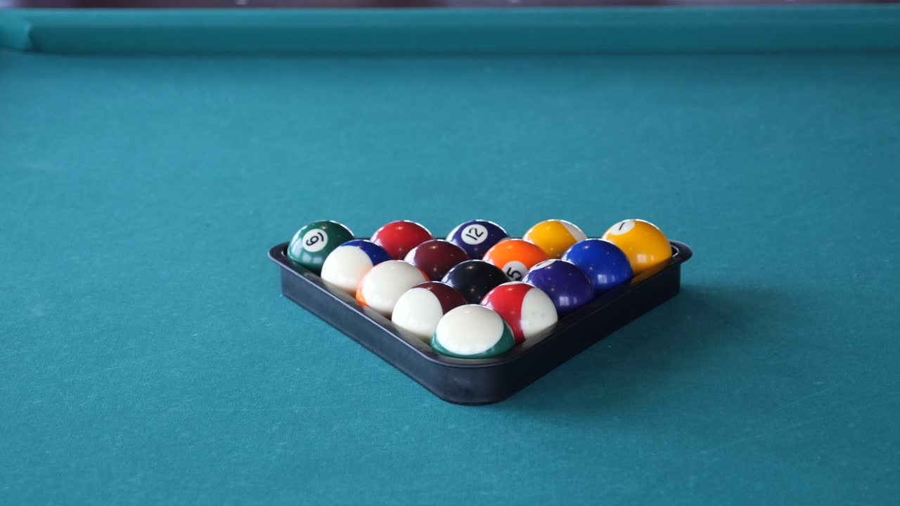 Pool table with balls in rack
