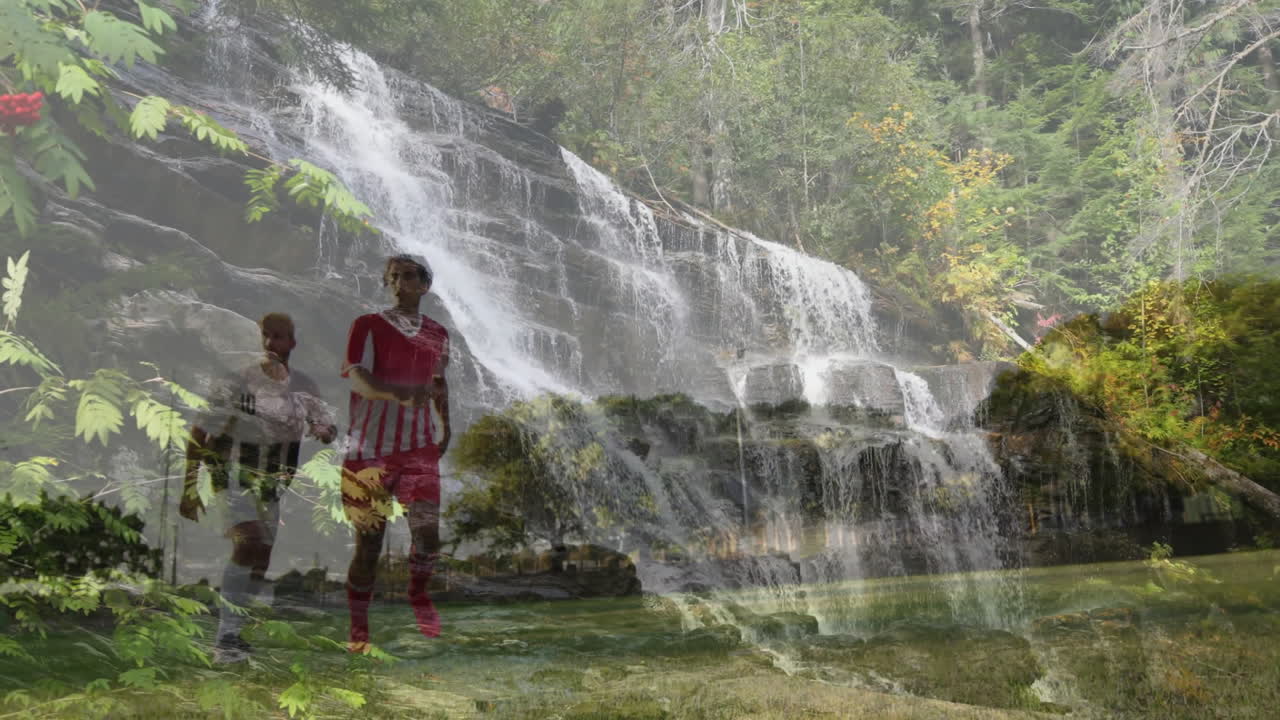 Hiking over scenic waterfall, man and child exploring lush forest environment