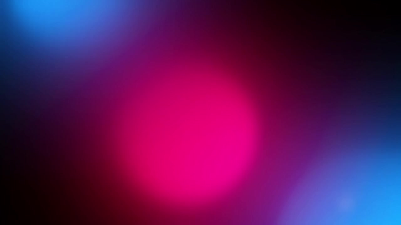 Abstrakti tausta hehkuvilla värikkäillä bokeh-valoefekteillä