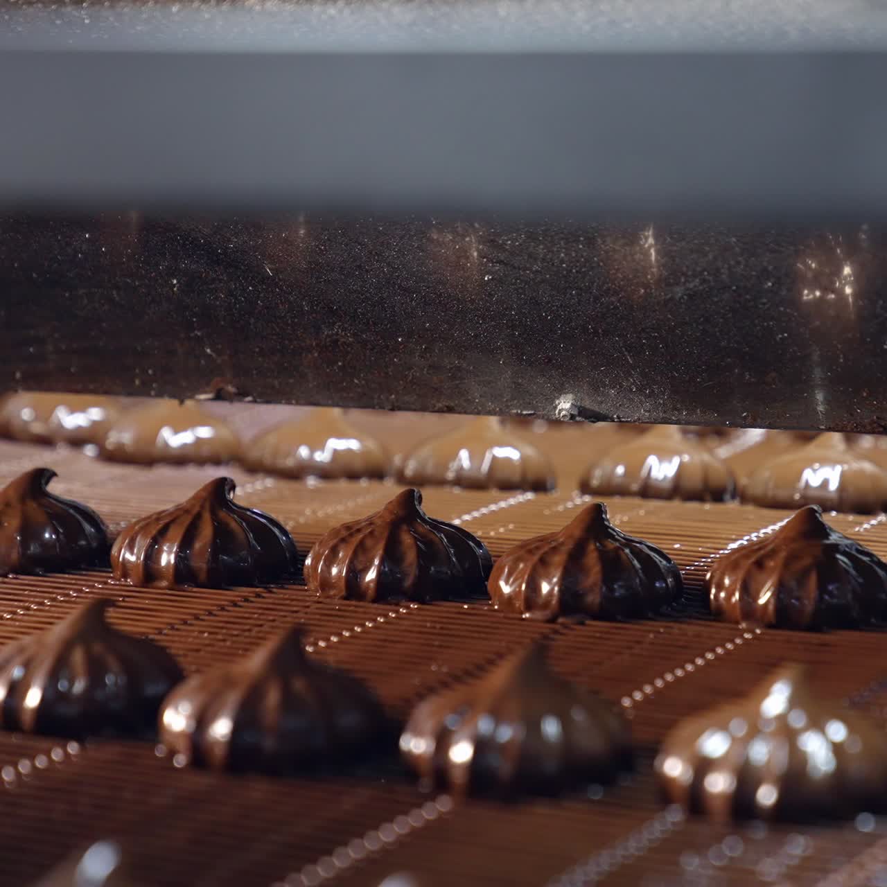 Chocolate Desserts on a Conveyor Belt
