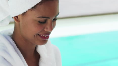 attractive woman smelling bowl