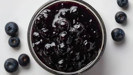 Top-View-Jar-Of-Fresh-Blueberry-Jam-With-Whole-Blueberries