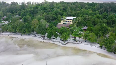 aerial landscape of white sand beach coastline on leebong private island in belitung indonesia
