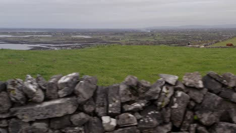 Pan-tracking-shot-of-a-typical-Irish-stone-wall