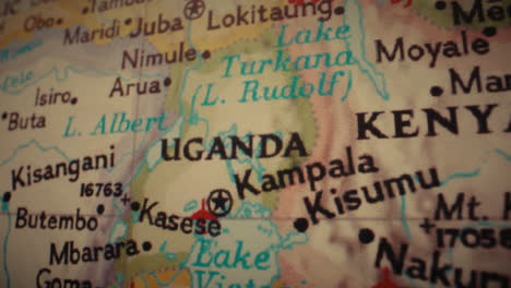 A close-up view of a map showing Uganda, Kenya, and surrounding East African countries and lakes