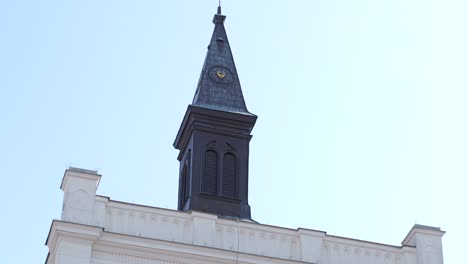 Low-angle-view-looking-up-at-steeple-atop-old-Lutheran-Church