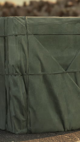 close-up of a military-style canvas crate