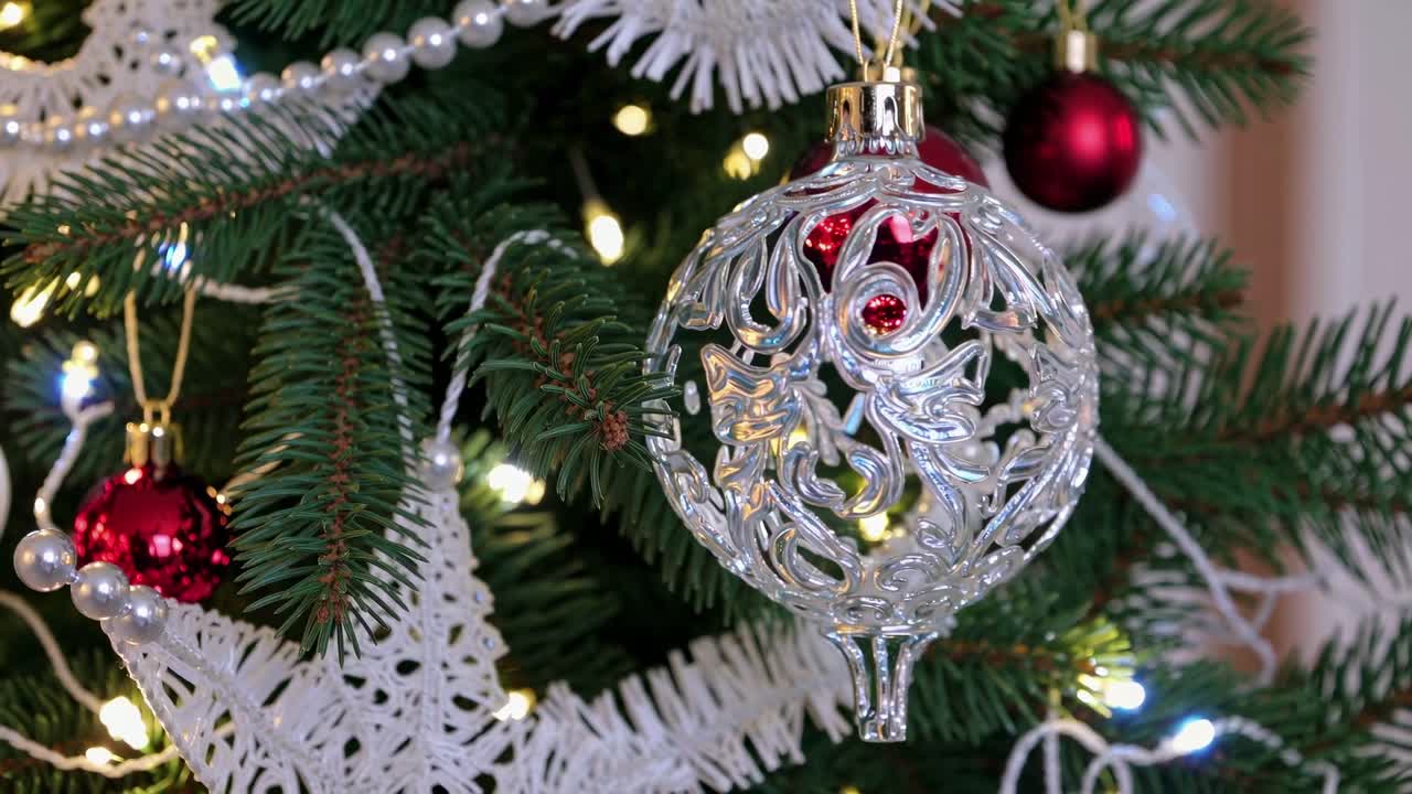Close-up angle of a decorated Christmas tree with intricate ornaments and lights