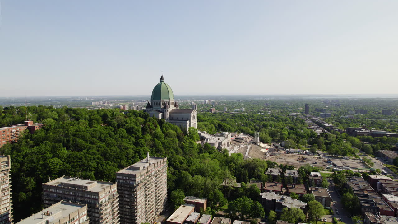 Aerial view flying toward the Saint Joseph's Oratory of Mount Royal in Montreal