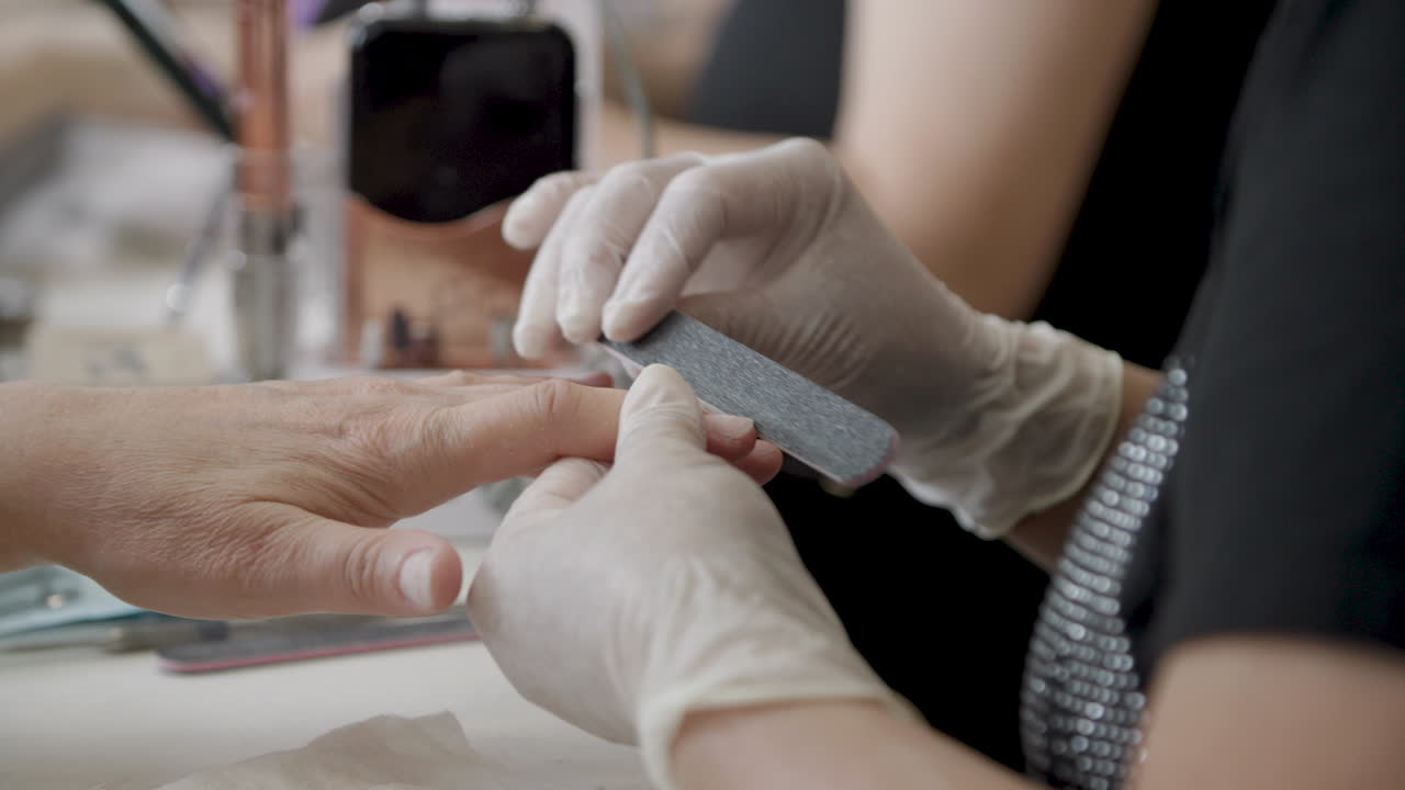 filing nails at a nail salon