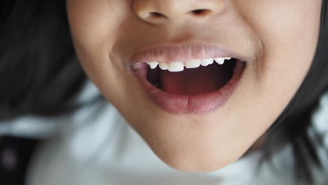 close up of a young girl smiling