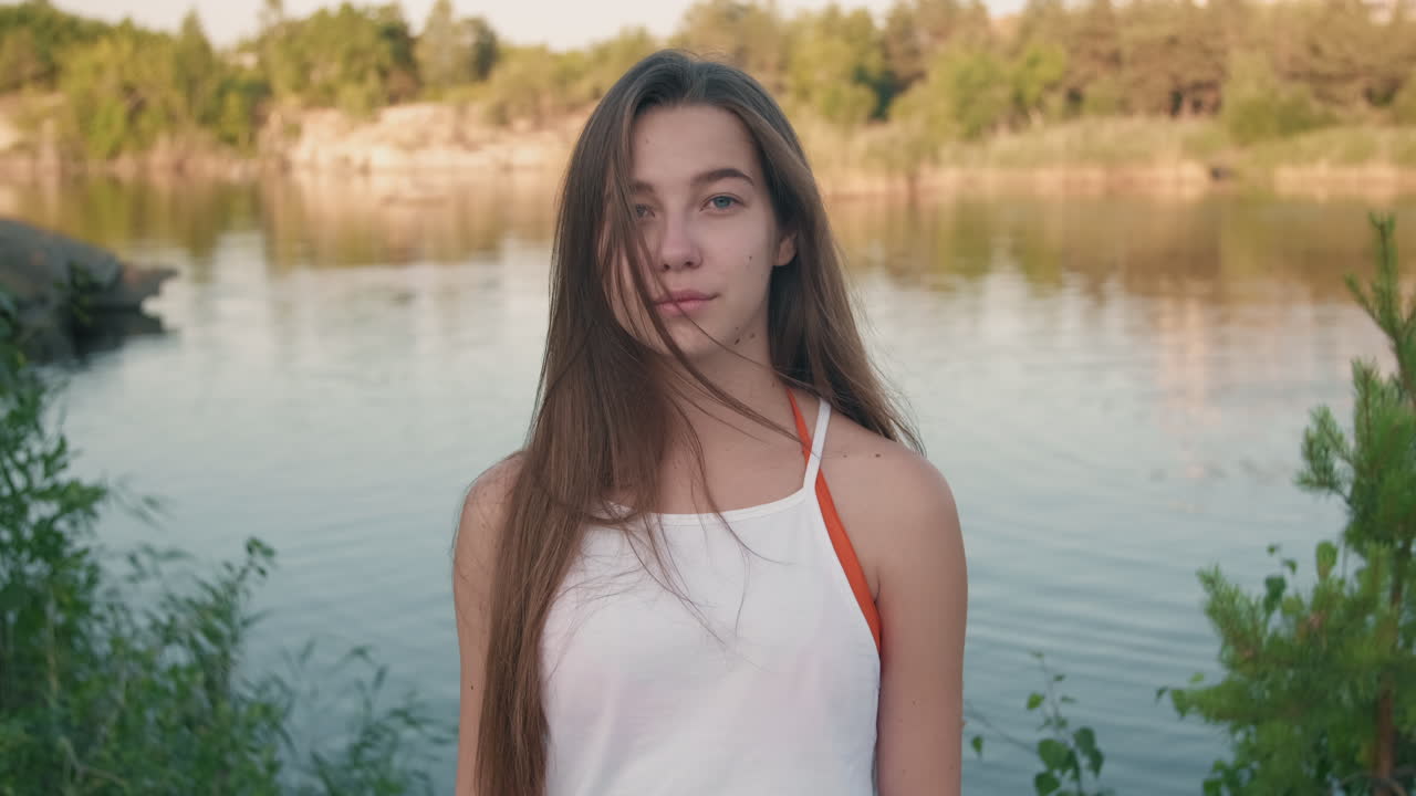 Portrait of Young Woman at Lake