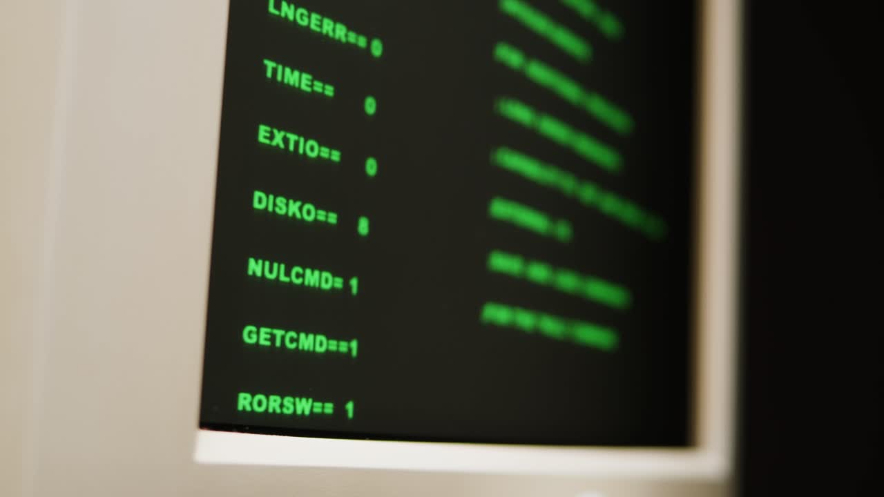 Vintage Computer Terminal Screen Displaying Code