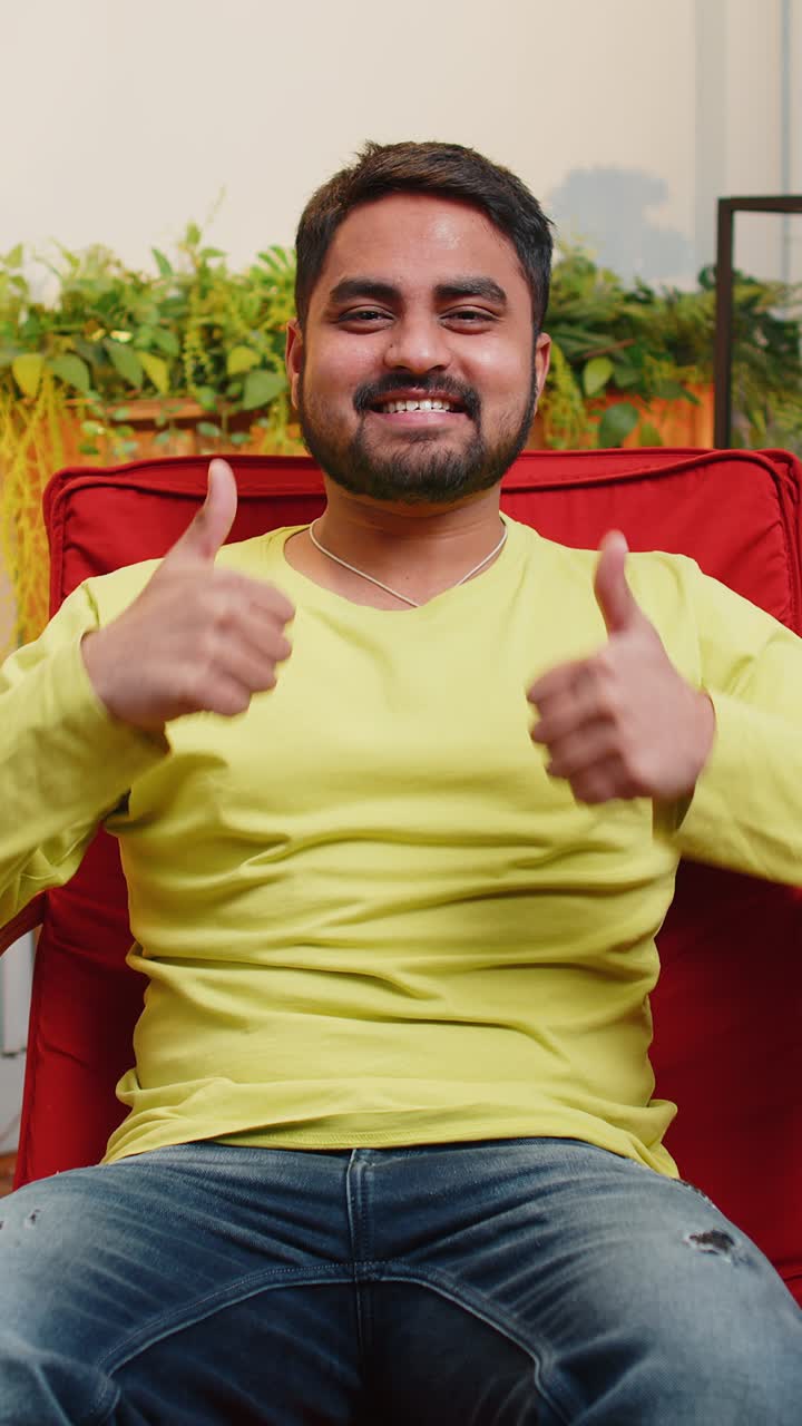 Excited happy indian man surprised shocked by sudden victory good win news celebrate wow reaction