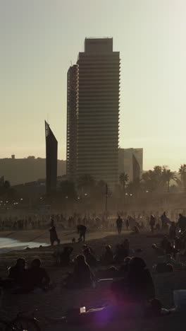 busy beach in sumer in vertical barcelona.