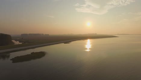 Aerial:-The-dykes-and-shoreline-of-the-Oosterschelde,-the-Netherlands