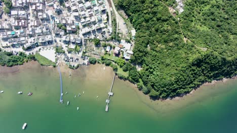 Hong-Kong-Tseng-Tau-Tsuen-waterfront-houses,-Aerial-view