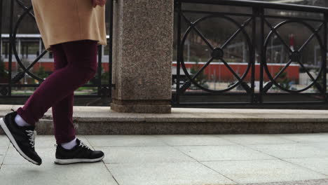 woman walking on a city street