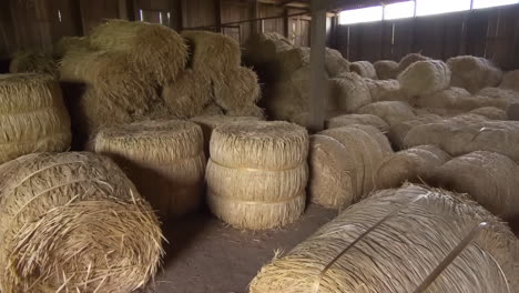 bales of hay stored in a barn