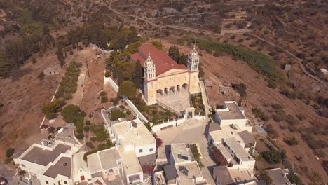 aerial drone shot pulling up revealing the architecture of the agricultural village of lefkes greece