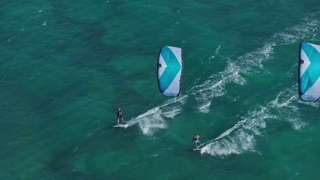 kiteboarding in turquoise water